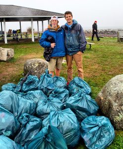 Crowley Gentile and Alex Wycoff at a beach cleanup in Rye, NH