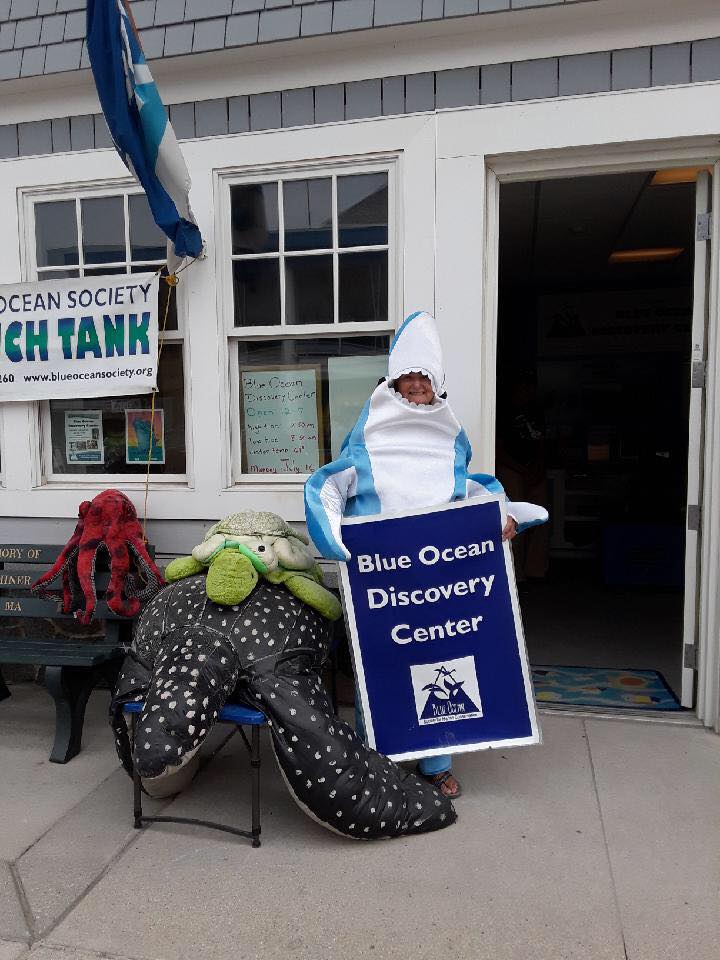 Blue Ocean Discovery Center co-founder and director, Cathy Silver, welcomes visitors wearing a shark suit! 
