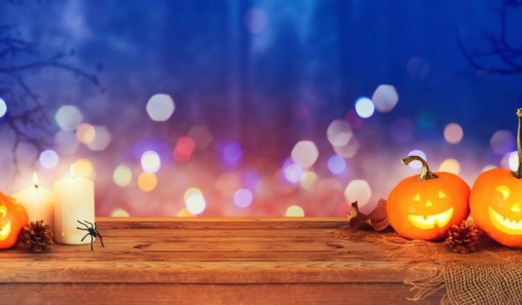 Halloween background image showing pumpkins and decor